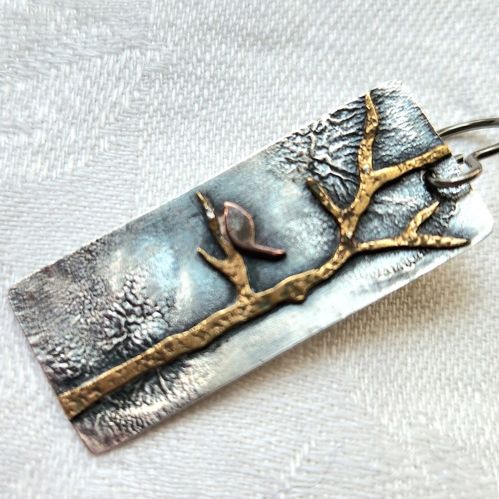 Silver birds in tree earrings